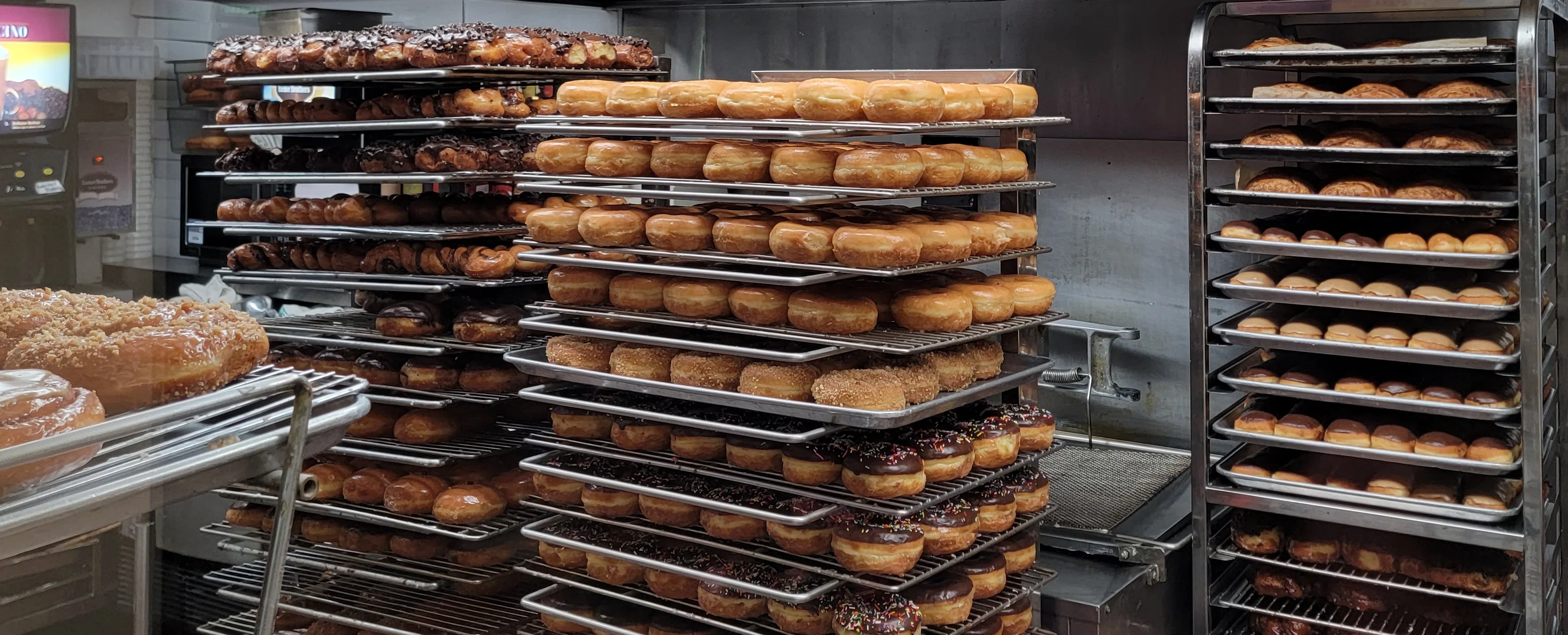 Display of assorted donuts in a bakery