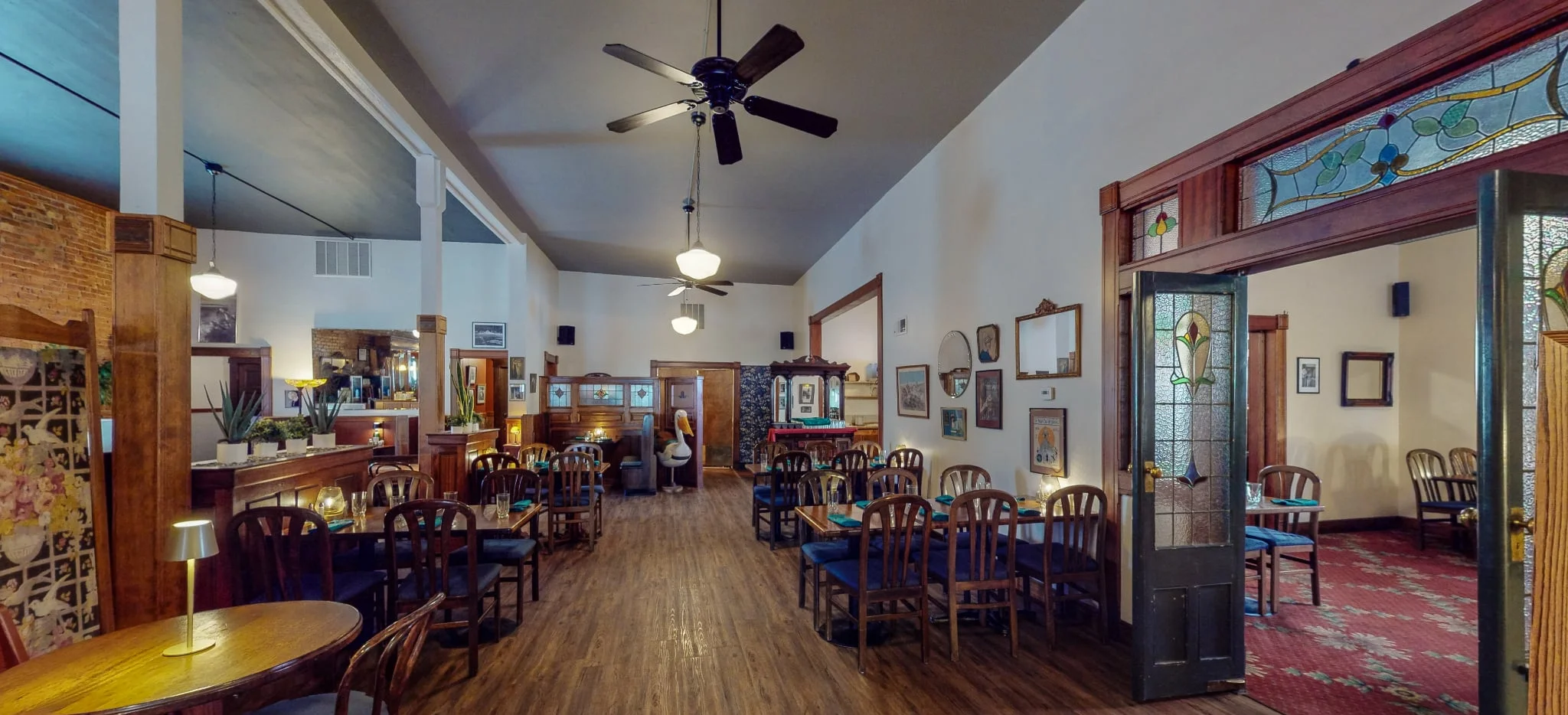 Cozy restaurant interior with wooden furniture and warm lighting
