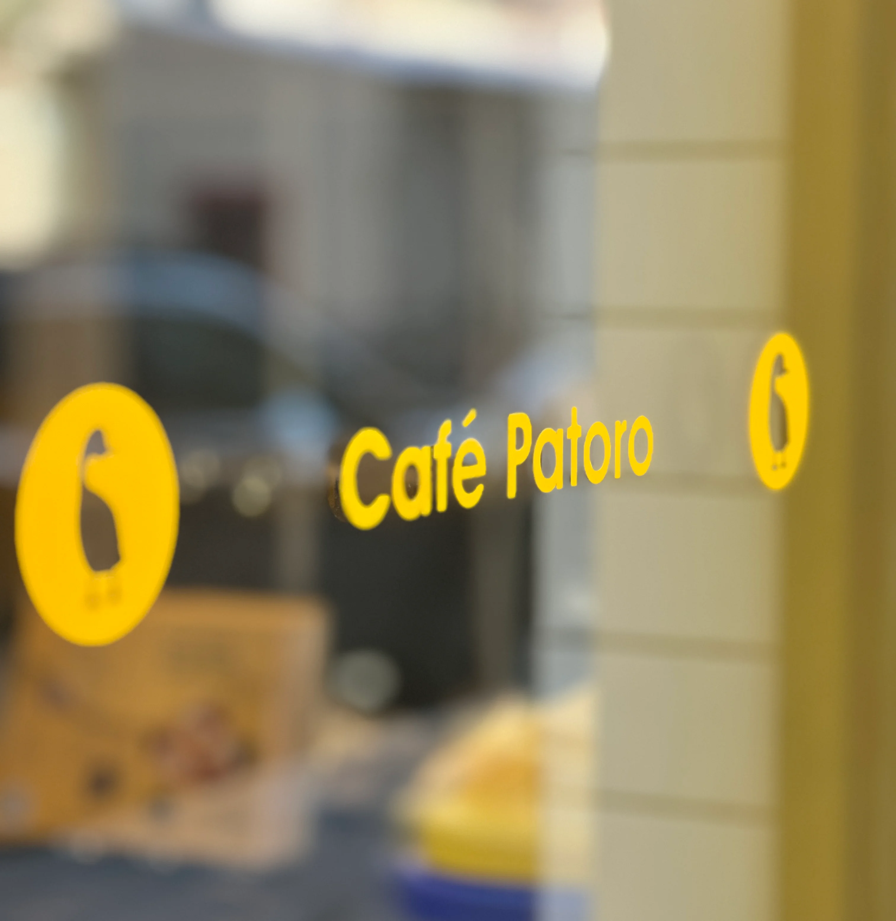 Entrance door of a restaurant with a welcoming design.