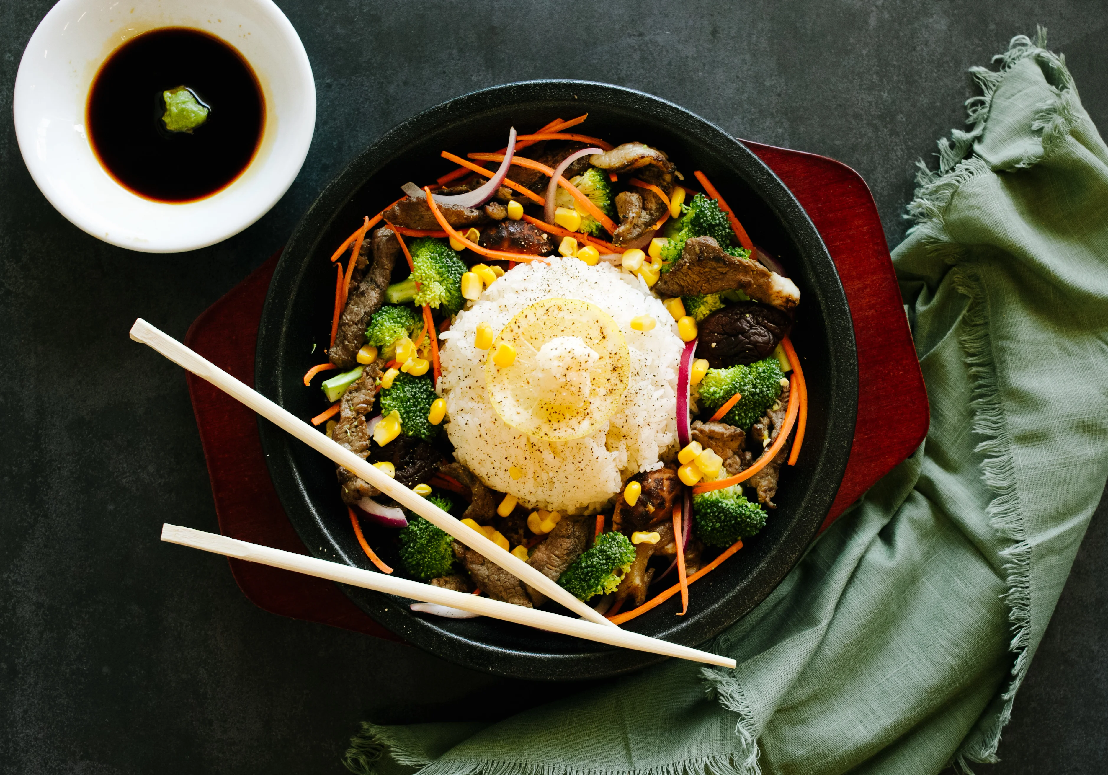 Sizzling Korean bulgogi with vegetables and rice