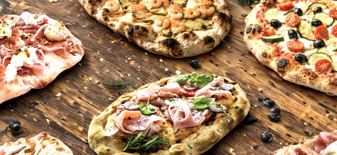 Assorted Mediterranean flatbreads with various toppings