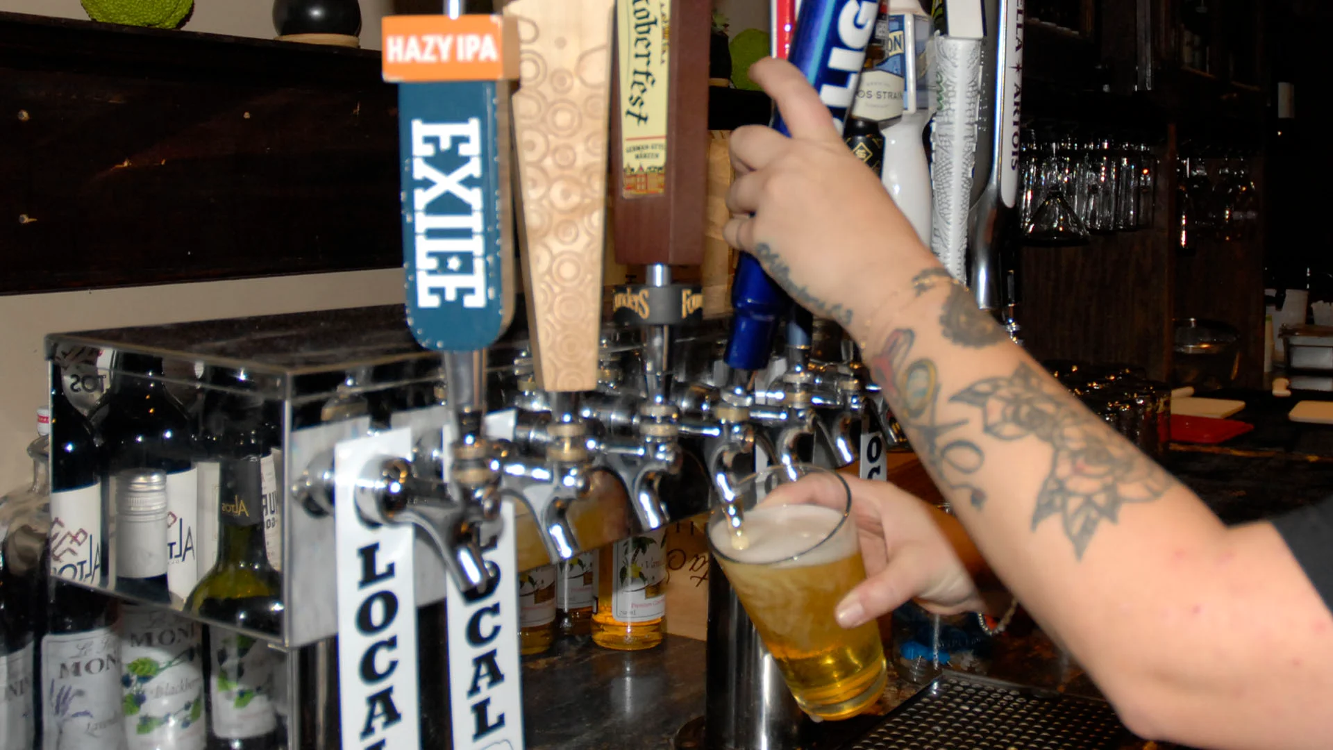 bartender pouring beer