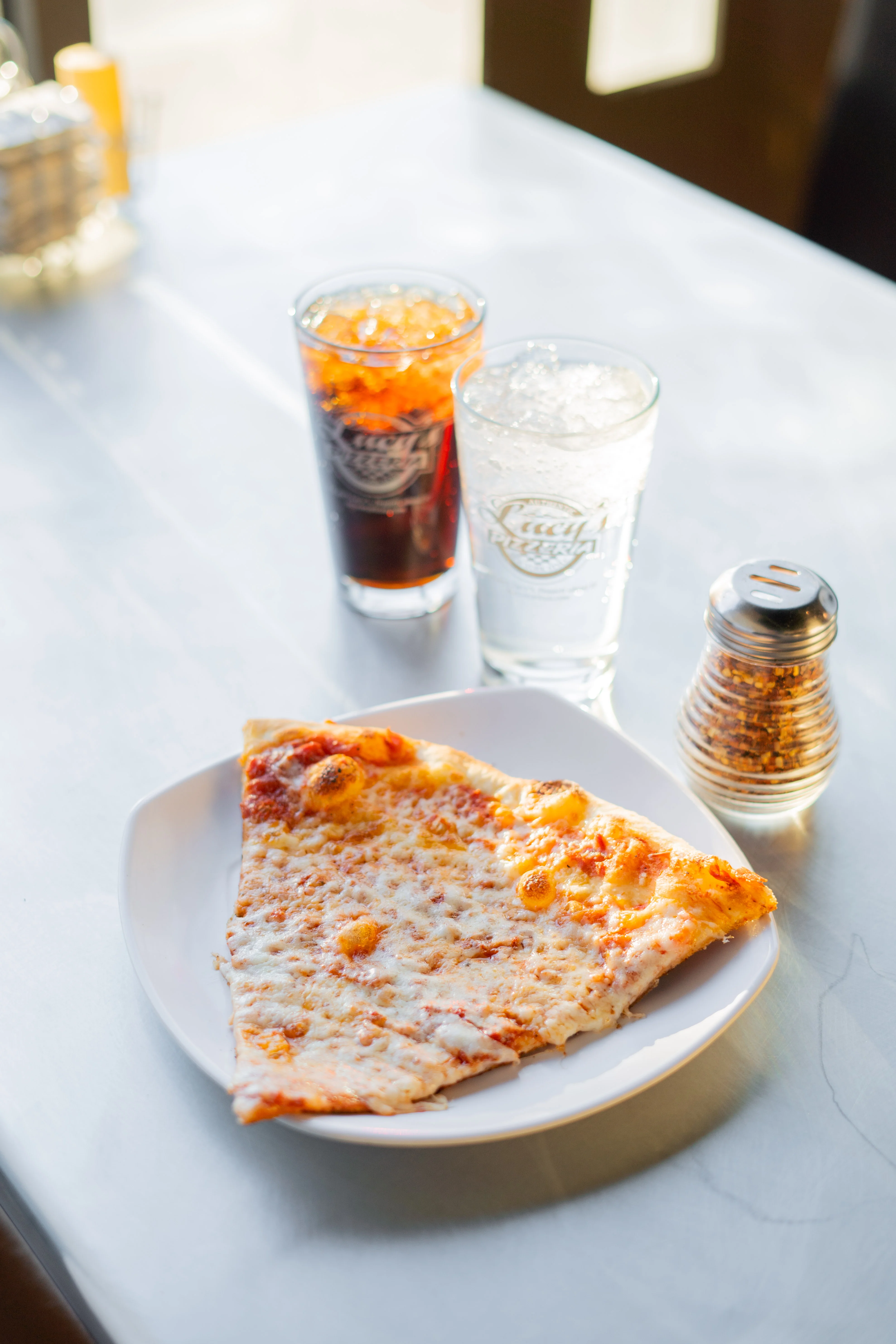table setting with a slice and drink