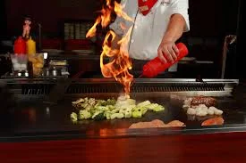 Sizzling chicken and beef fajitas with vegetables