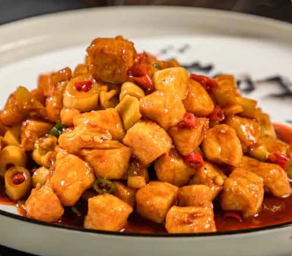 Spicy Sichuan chicken stir-fry with peppers and cashews