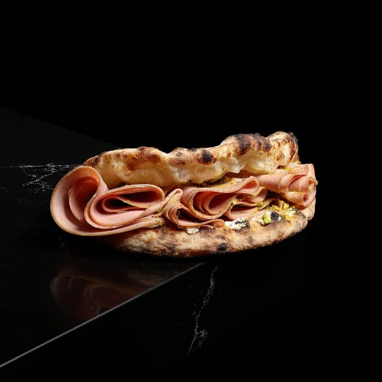 Italian focaccia with layers of ham