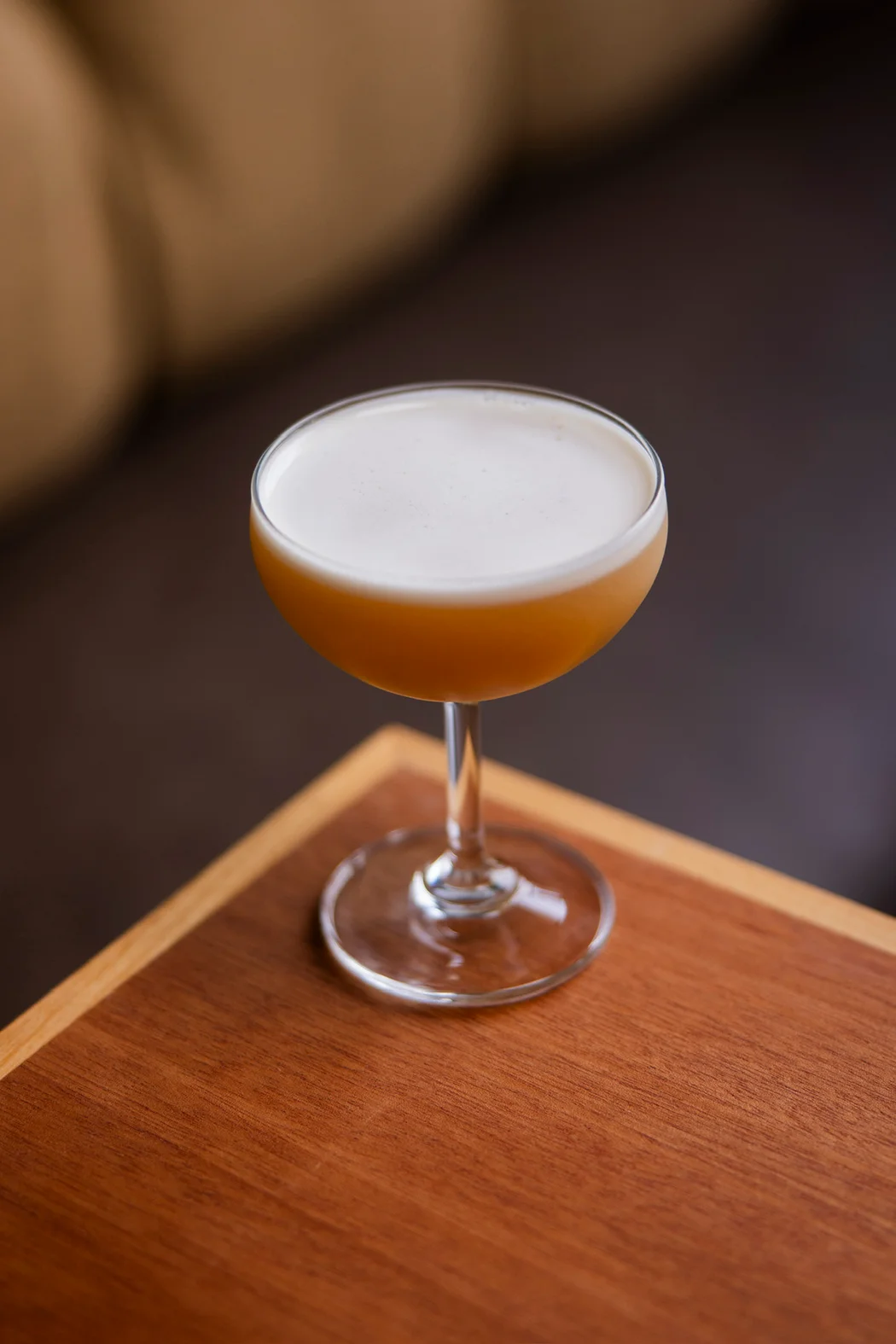 Craft cocktail served in a coupe glass