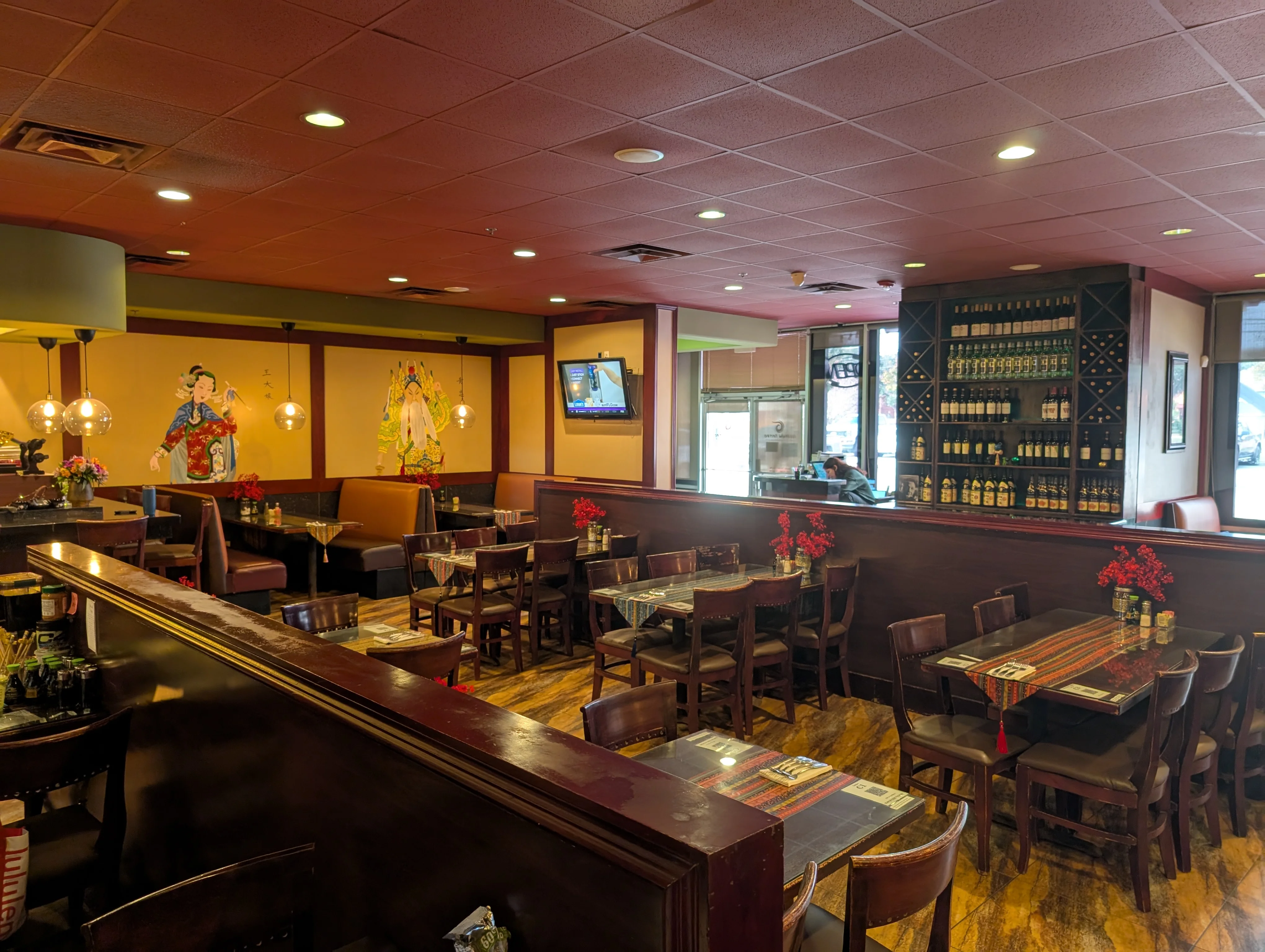 Cozy restaurant interior with Asian decor and warm lighting