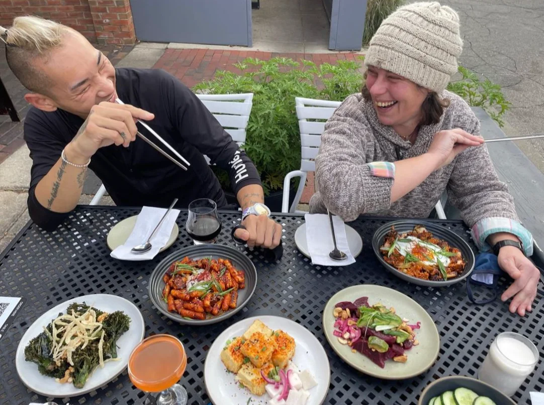 Friends eating together at Miss Kim's