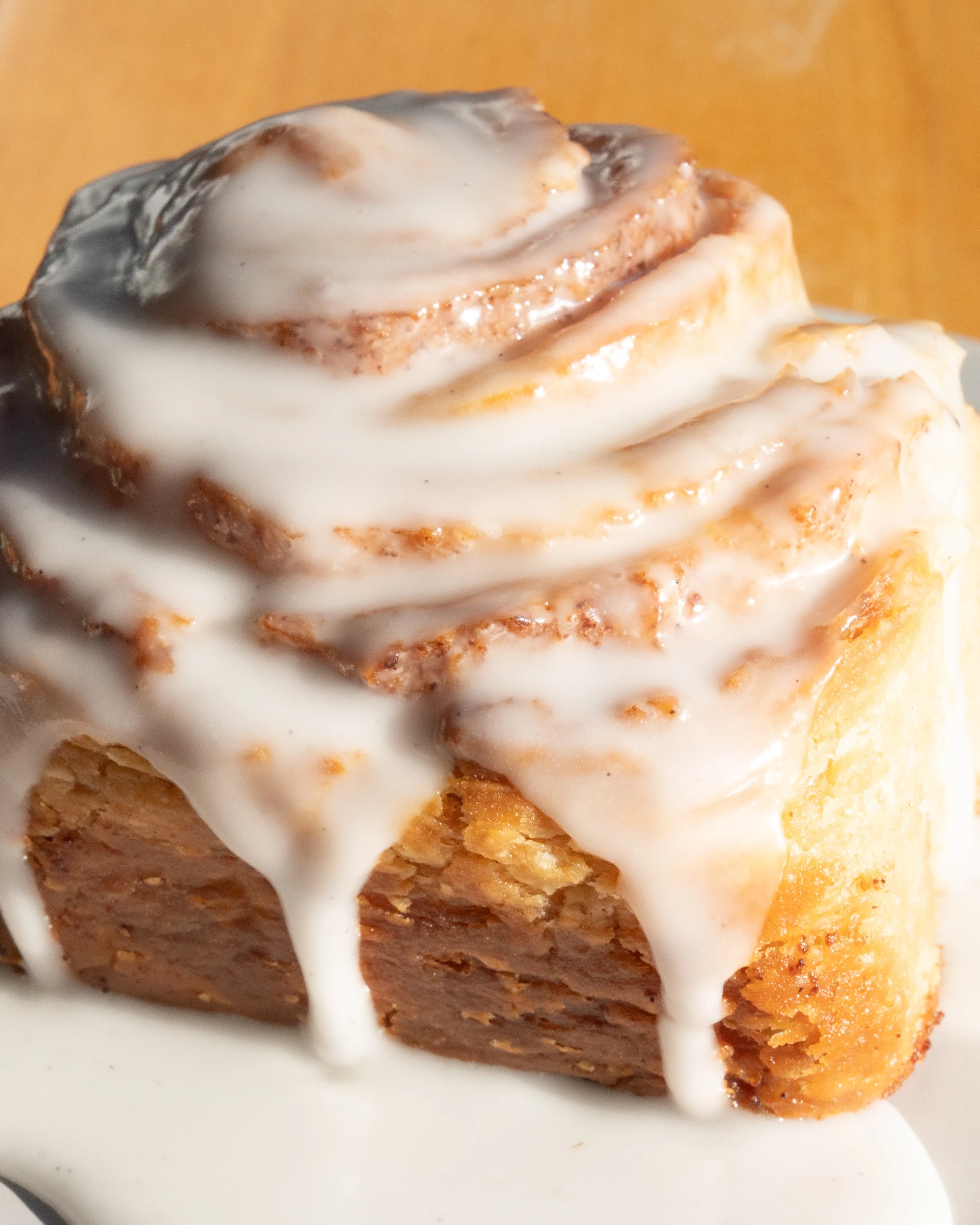Freshly baked cinnamon roll with icing