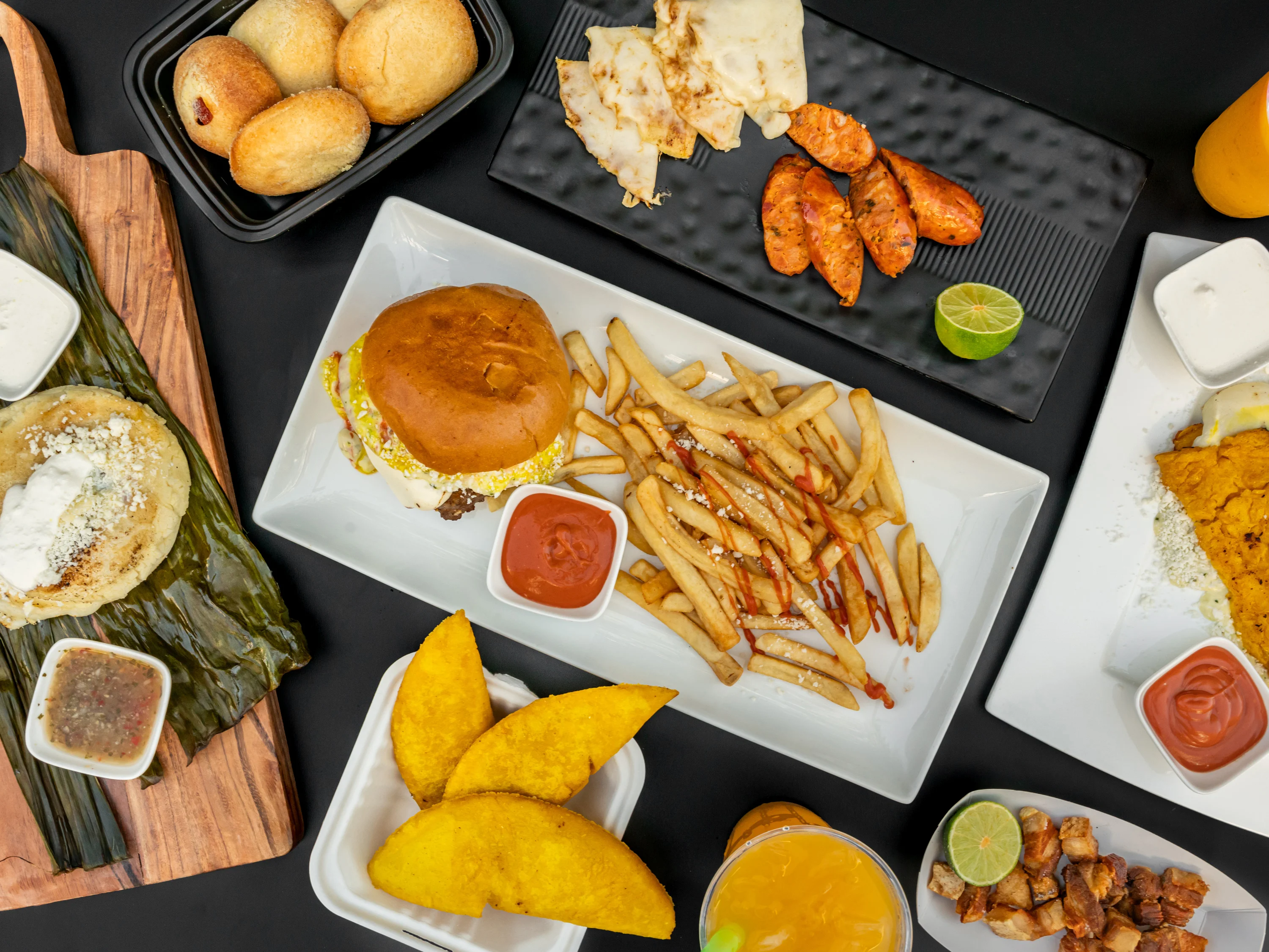 An inviting buffet setup showcasing vibrant and freshly prepared Colombian dishes, perfect for any catered event. Elevate your celebration with our authentic catering services