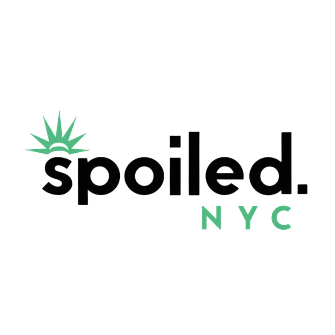 Logo of Spoiled NYC featuring a stylized Statue of Liberty