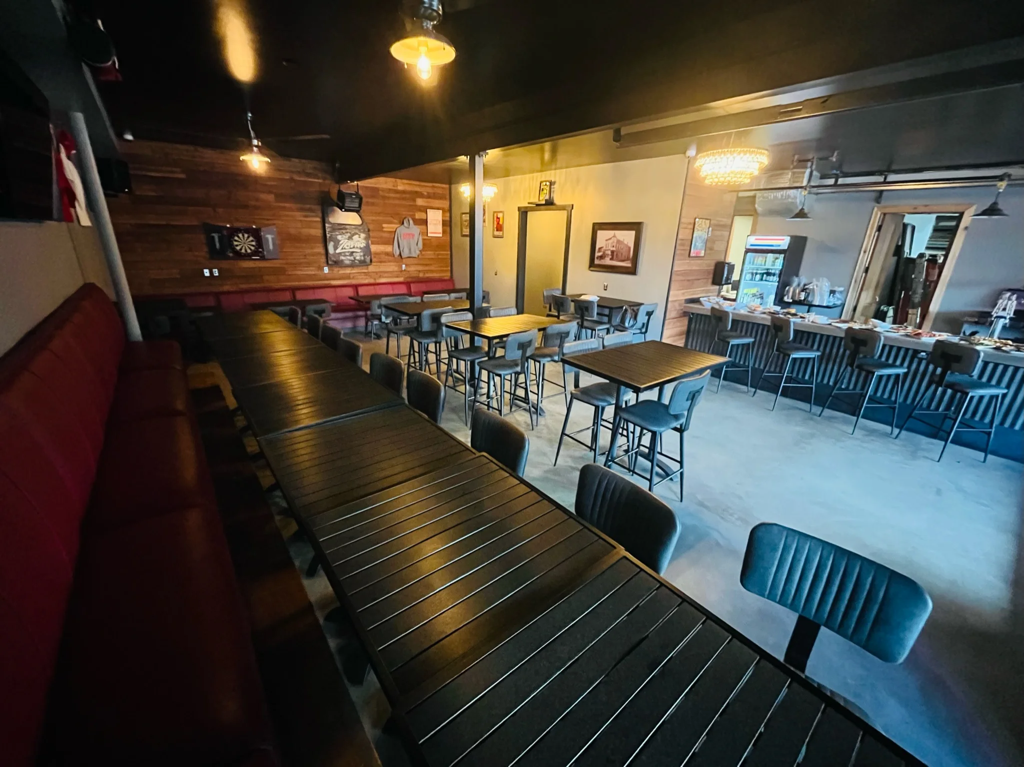 Modern restaurant interior with stylish seating and bar area