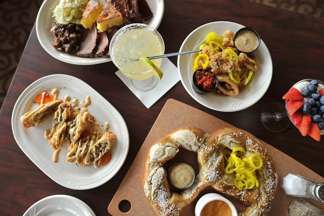 Assorted appetizers and drinks in a vibrant restaurant setting
