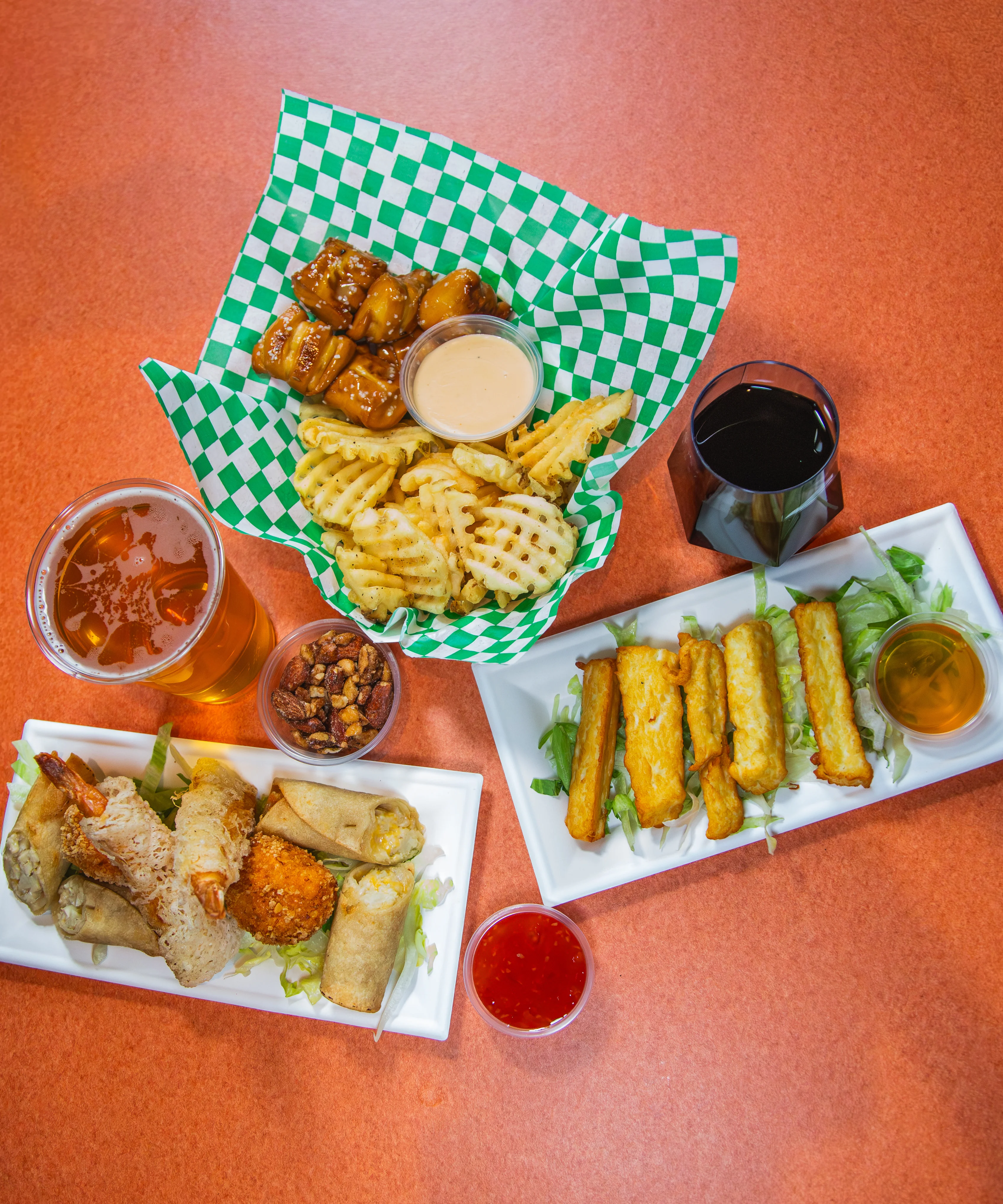 Assorted Asian appetizers with dipping sauces