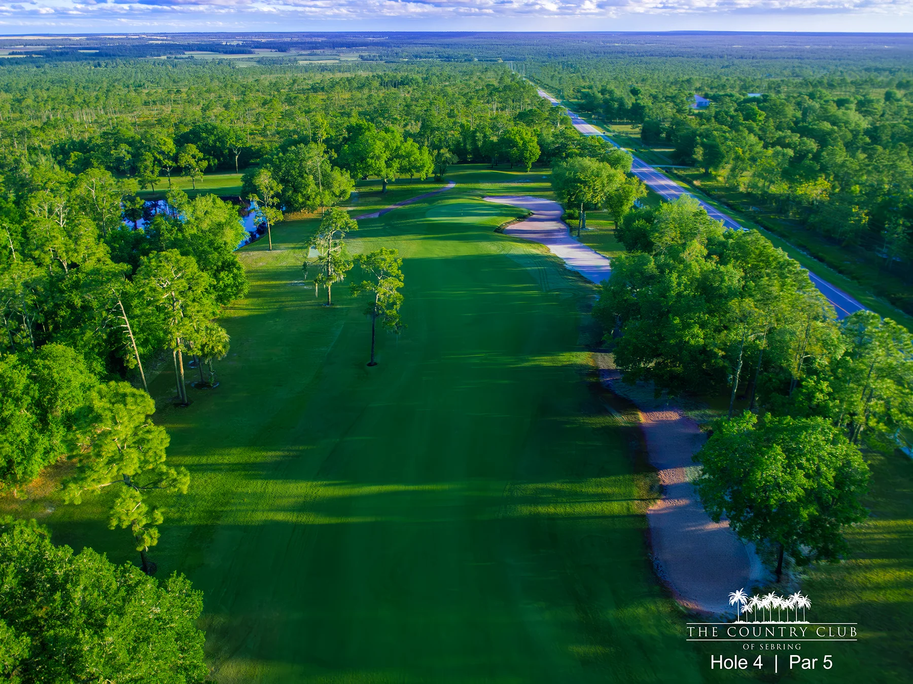 Aerial view of Hole 4 at The Country Club of Sebring, a scenic golf course