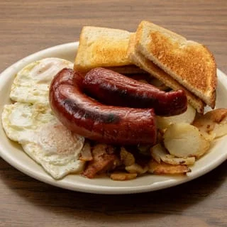 Classic American breakfast with sausage, eggs, and toast