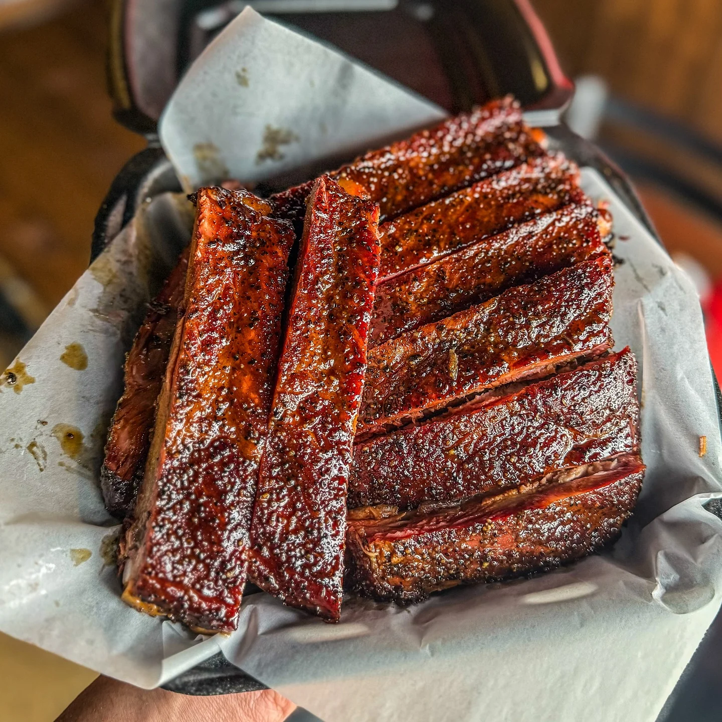 Smoked barbecue ribs served in a basket