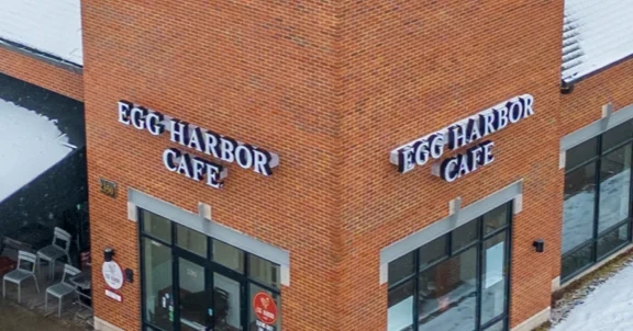 Exterior view of Egg Harbor Cafe with brick facade