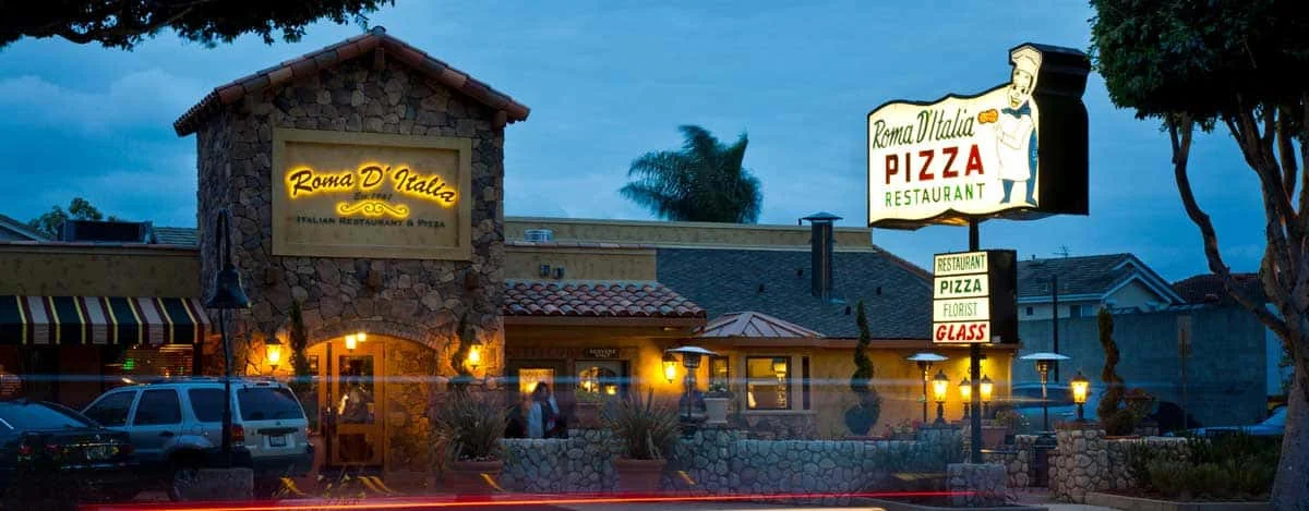 Charming Italian restaurant exterior at dusk