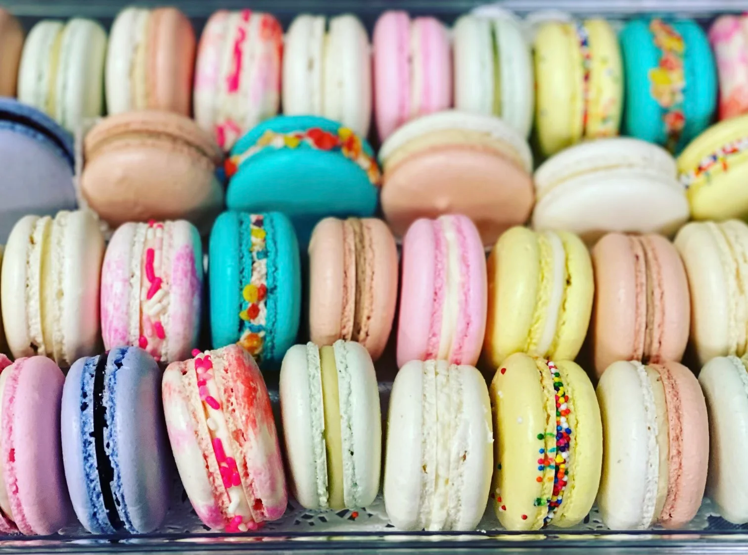 Colorful French macarons arranged in a display