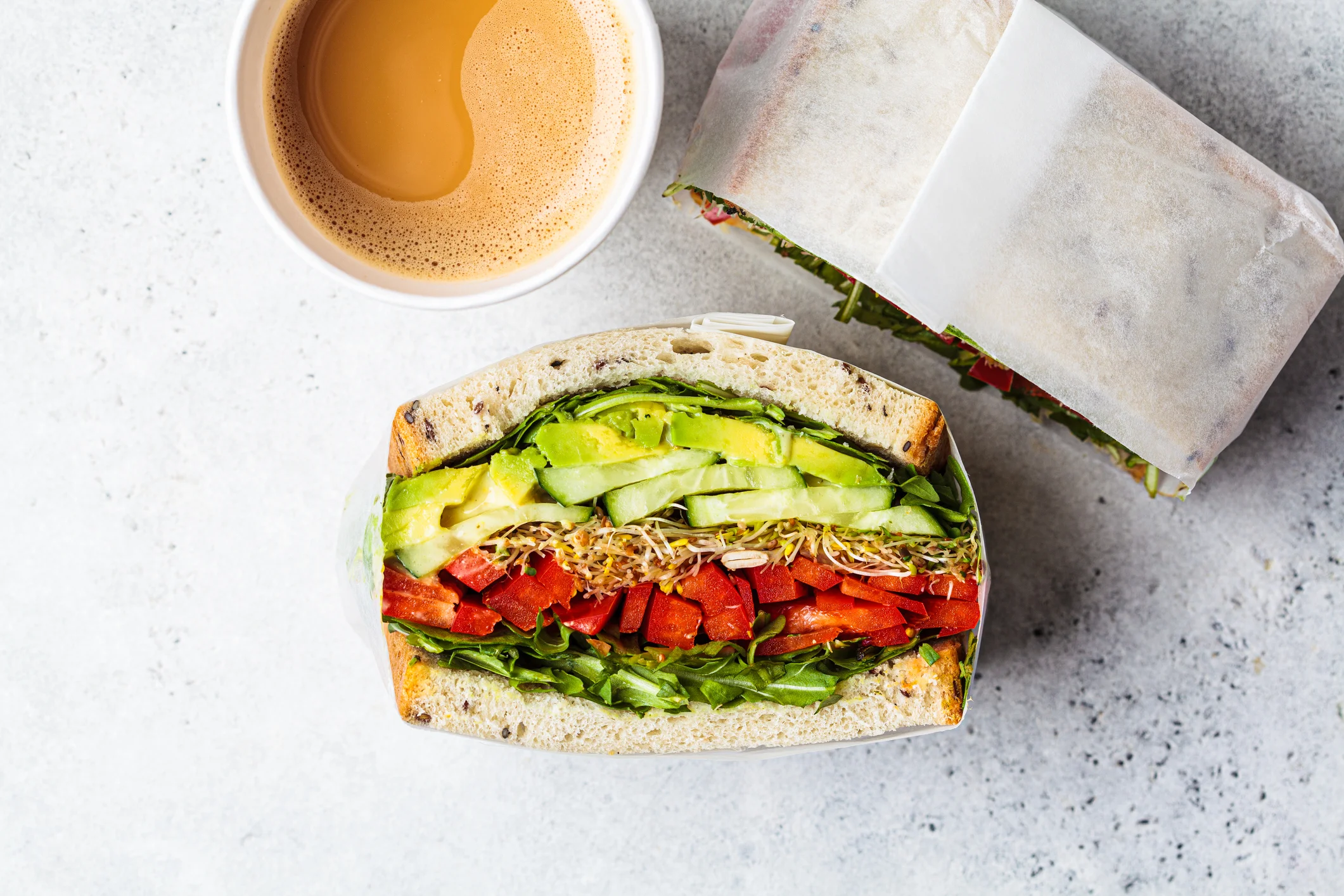 Fresh vegetarian sandwich with avocado and red peppers