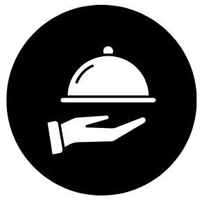 Hand serving a cloche for a fine dining experience