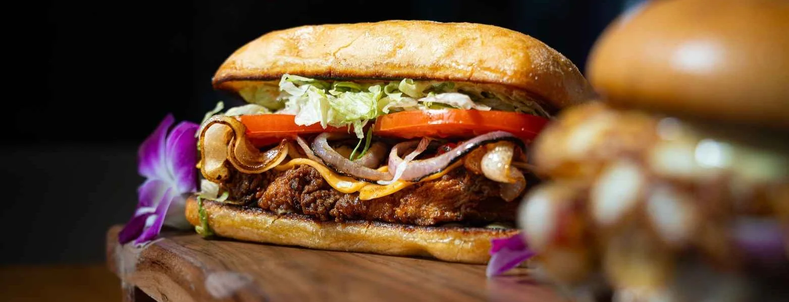 Crispy fried chicken sandwich with fresh toppings