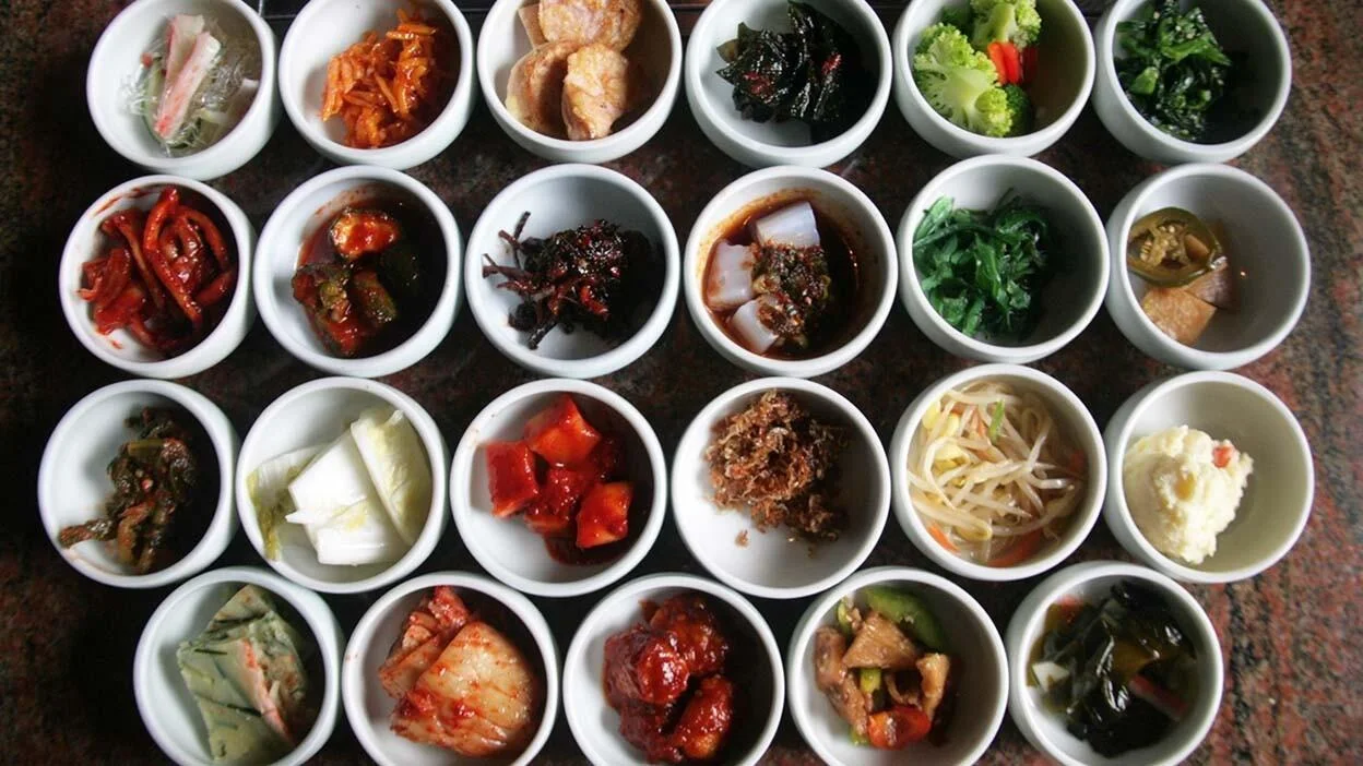 Assorted Korean banchan side dishes in small bowls