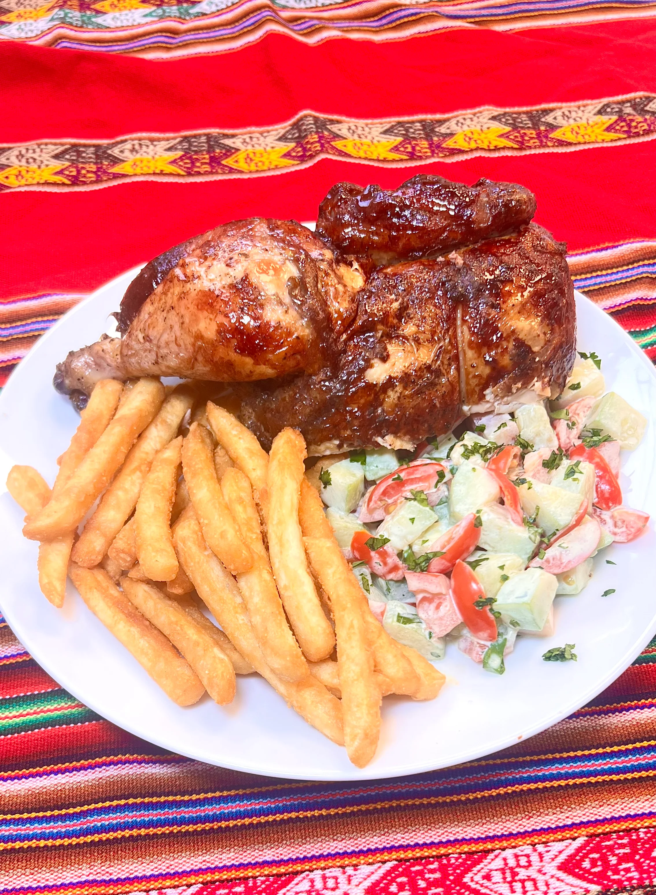 Peruvian roasted chicken with fries and salad