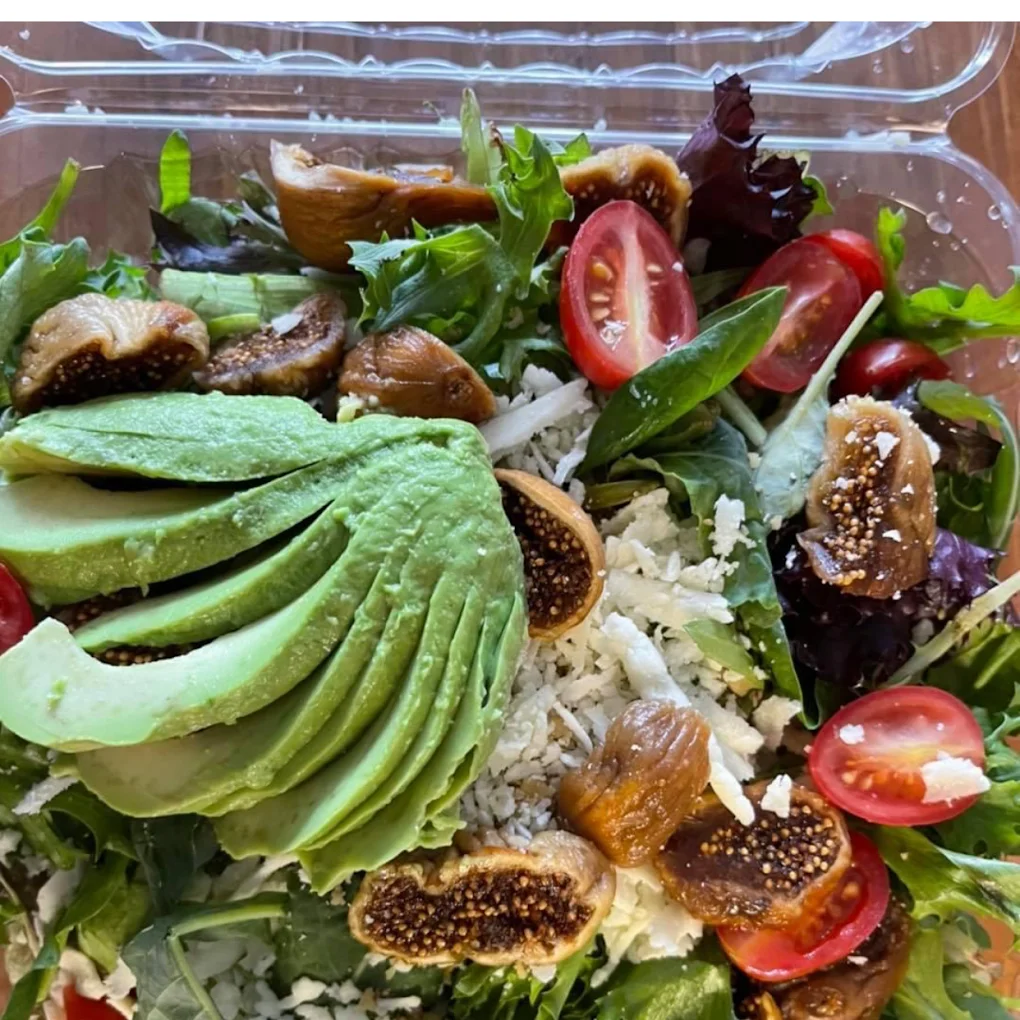 Fresh Mediterranean salad with avocado and figs