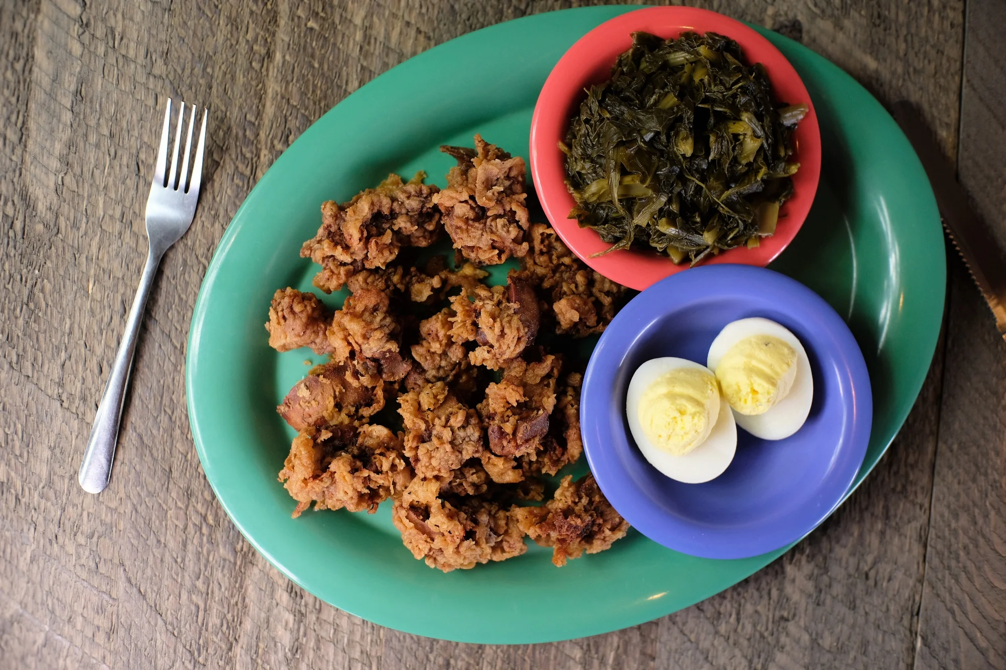 Southern-style fried catfish with collard greens and deviled eggs