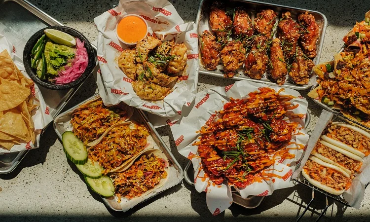 Menu display featuring a variety of delicious dishes at Kobop restaurant.