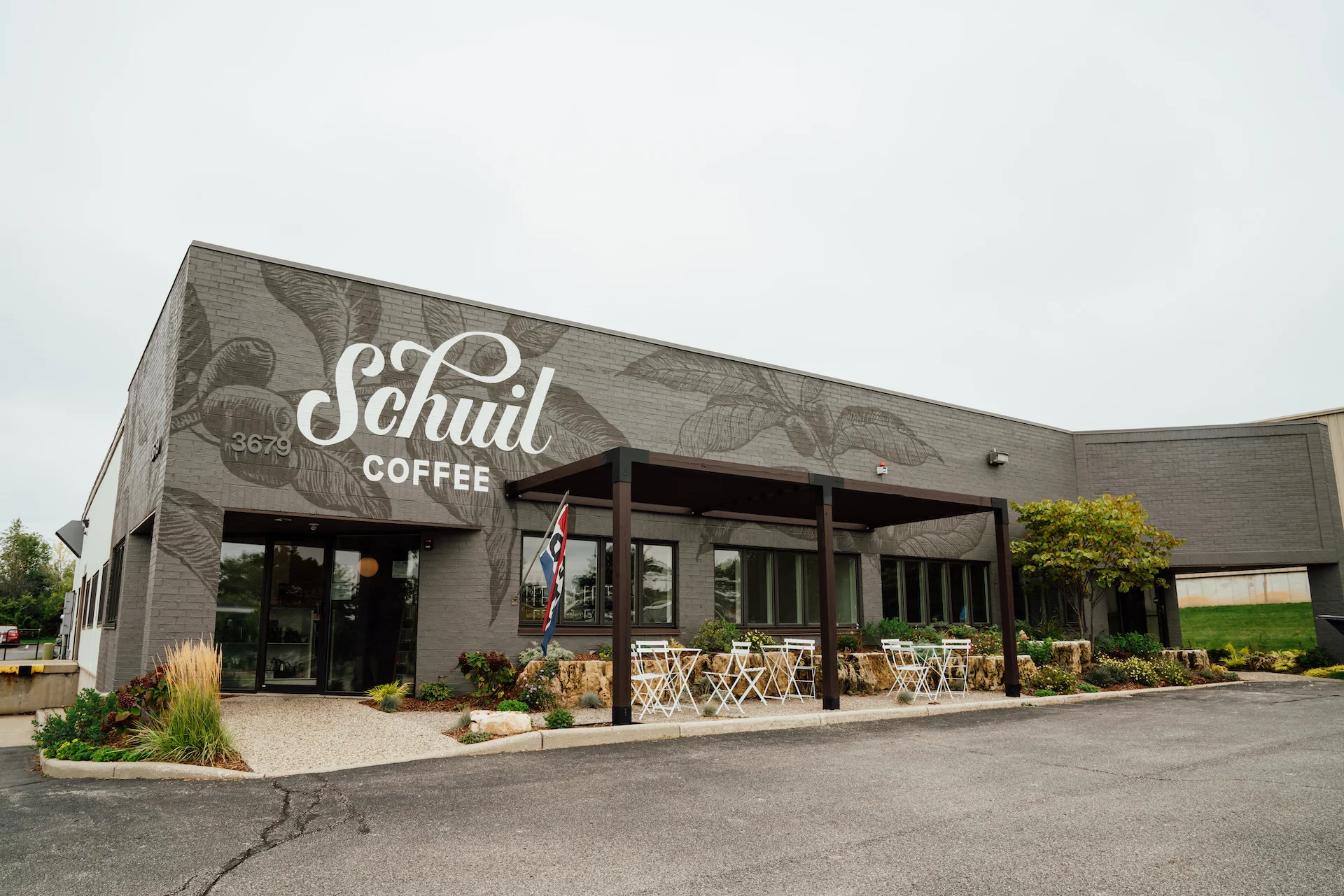 Exterior of Schuil Coffee shop with outdoor seating