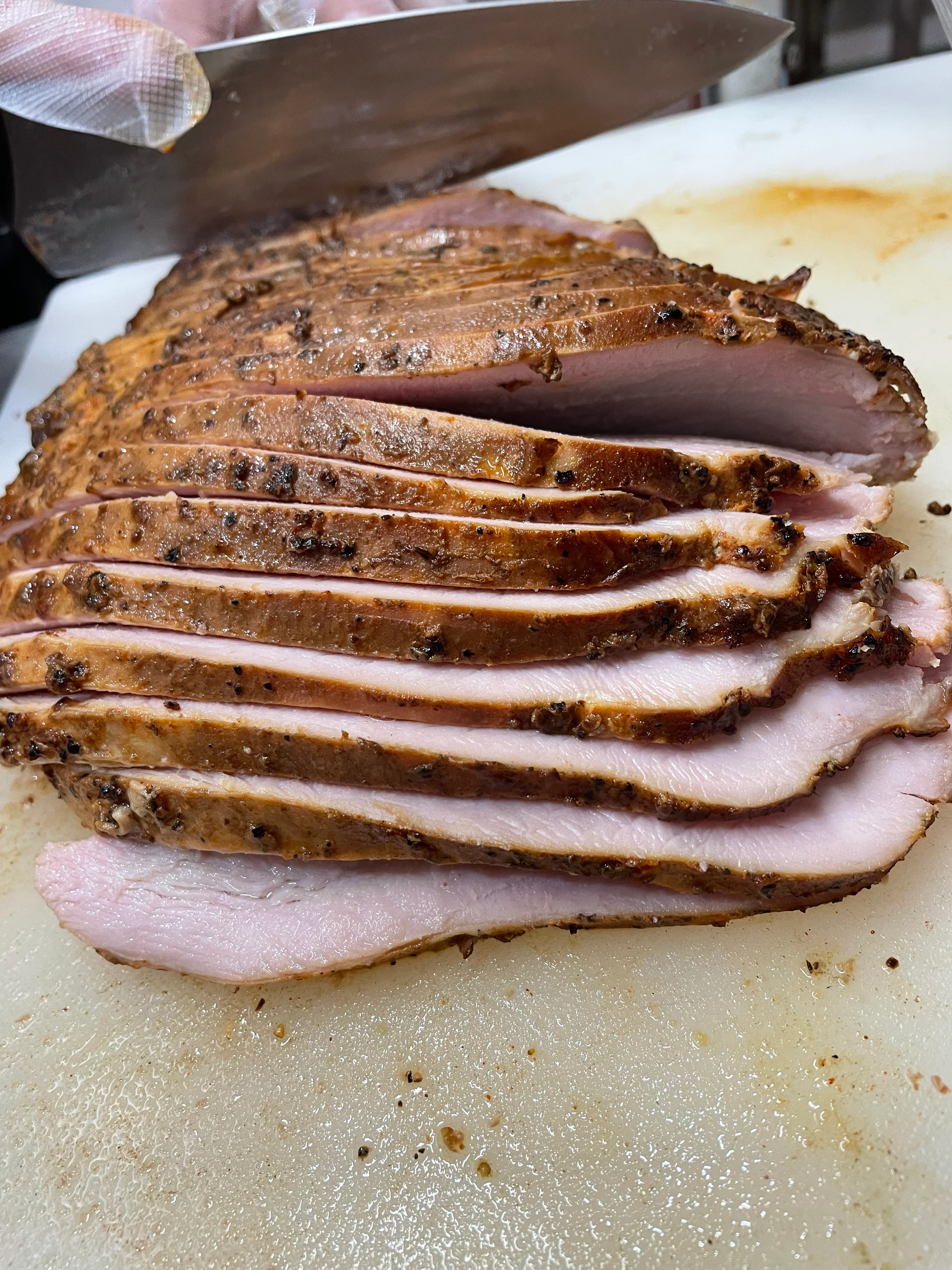 Deliciously smoked brisket served on a wooden platter.