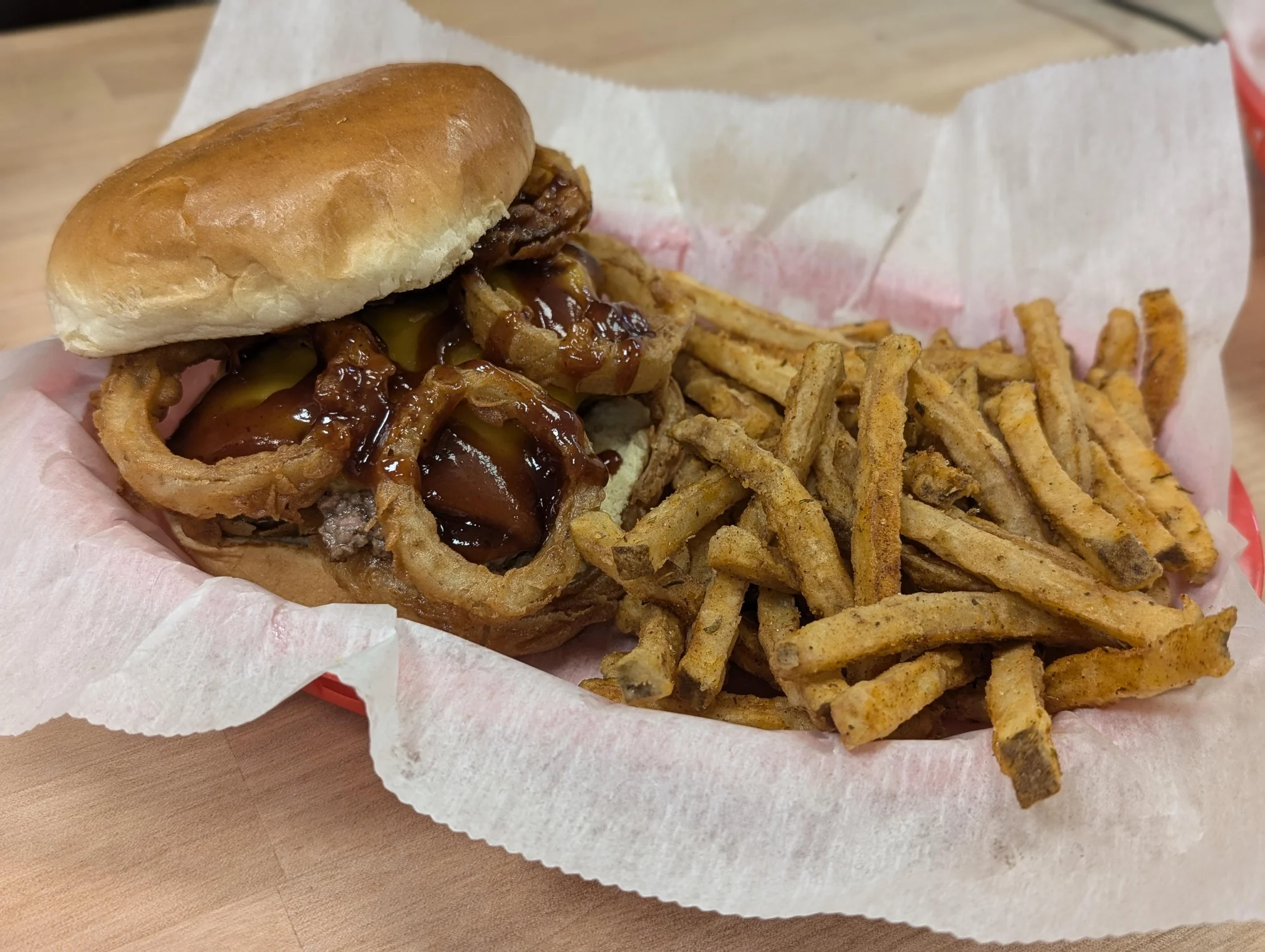 BBQ pulled pork sandwich with onion rings