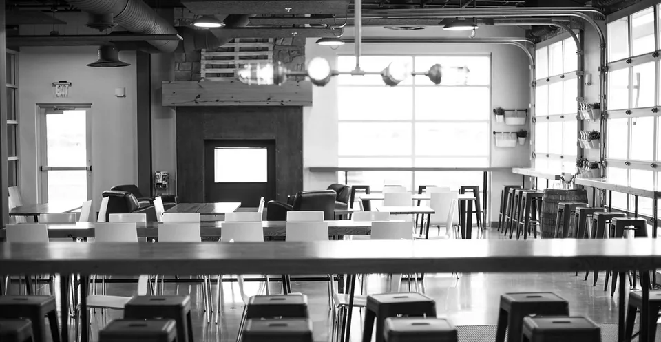 Modern restaurant interior with wooden accents and ample seating