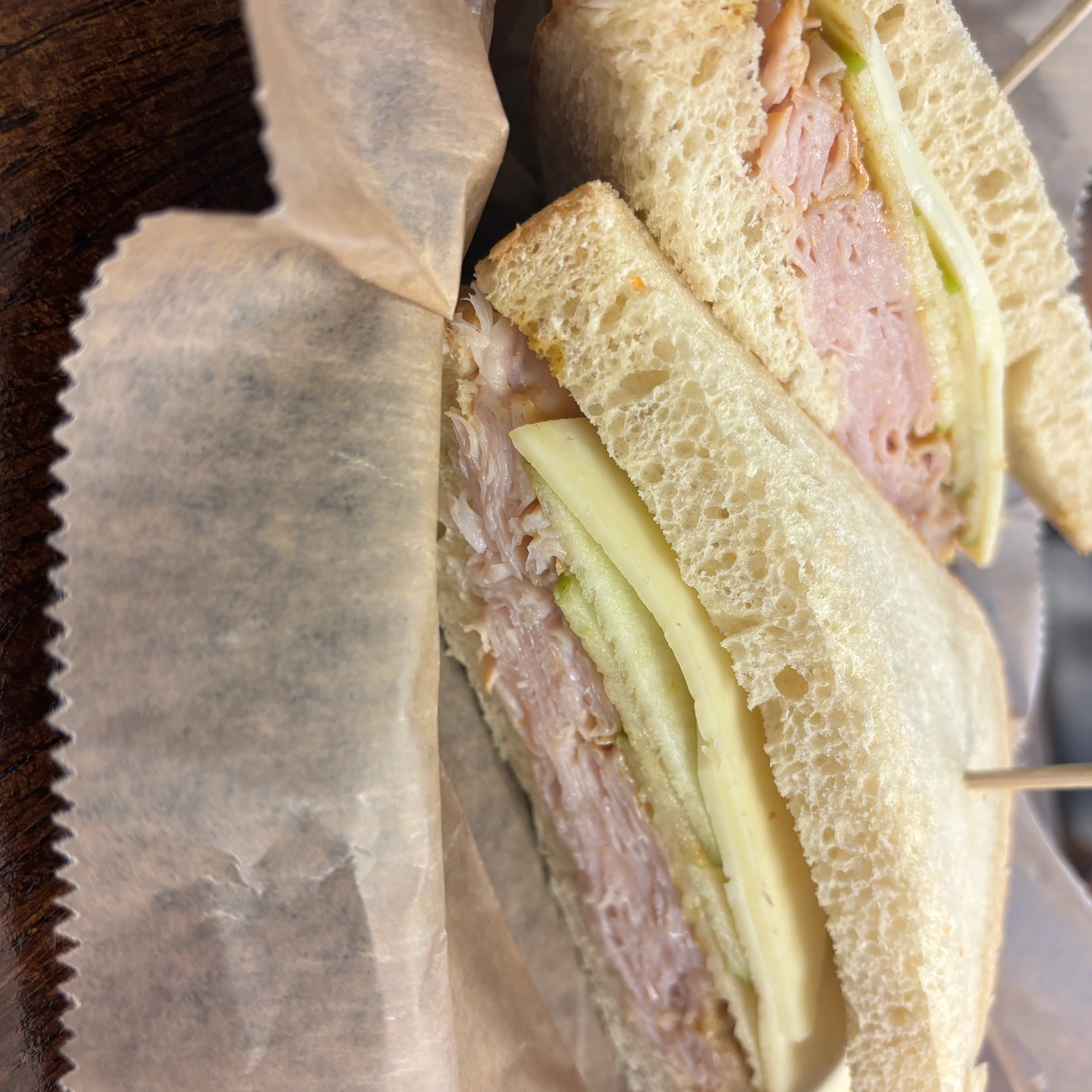 Classic ham and cheese sandwich on white bread