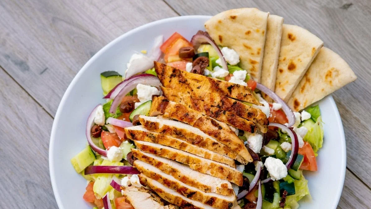 Grilled chicken salad with Mediterranean flavors