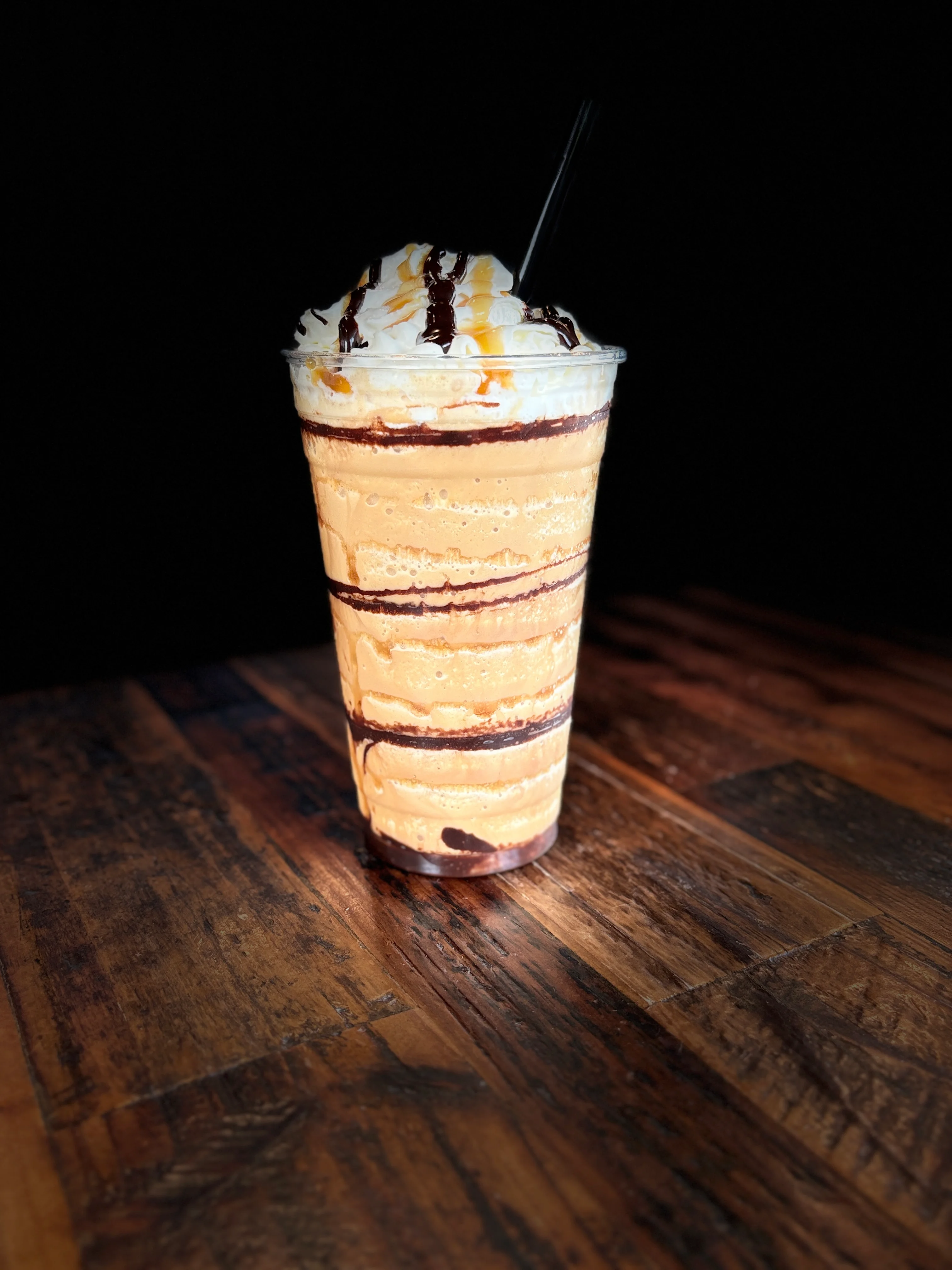 Delicious caramel frappuccino topped with whipped cream