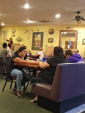 Cozy restaurant interior with diners enjoying their meals