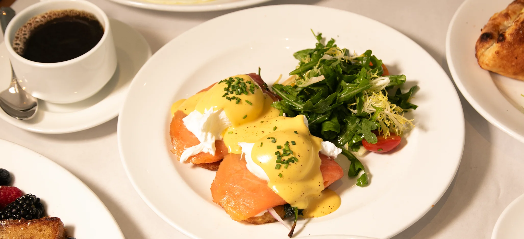 Eggs Benedict with smoked salmon and salad