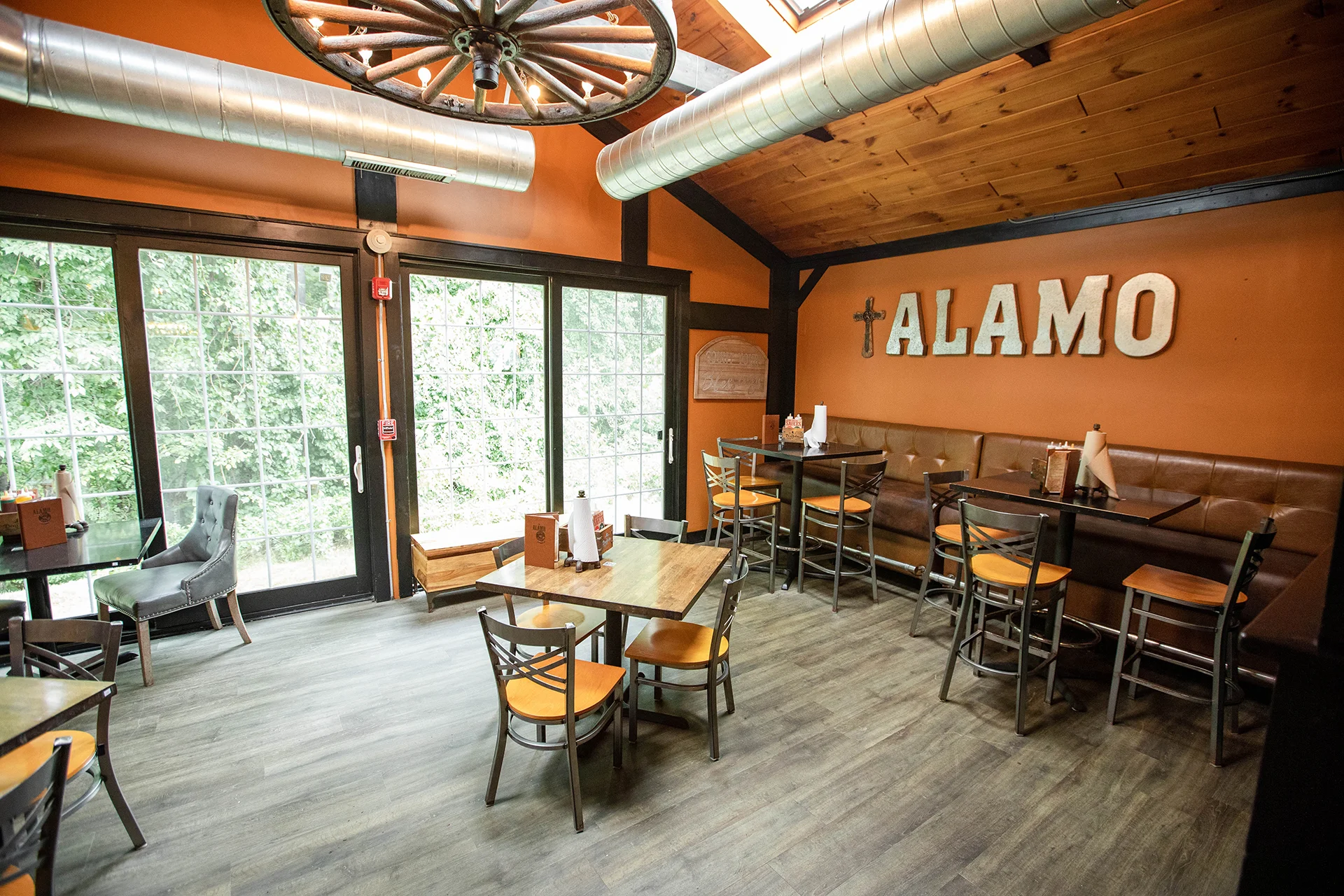 Cozy restaurant interior with rustic decor and warm lighting