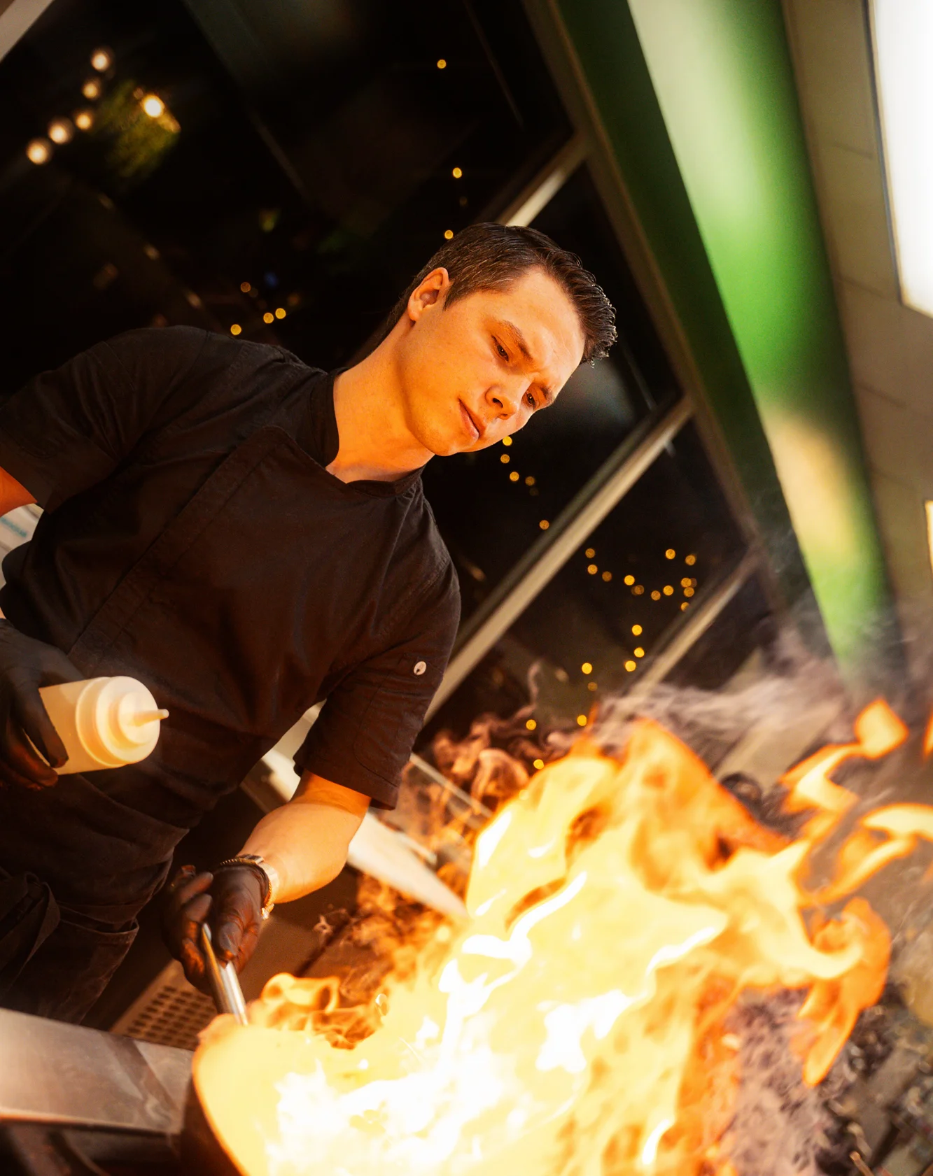 Chef Dante at a carving station serving delicious meats.