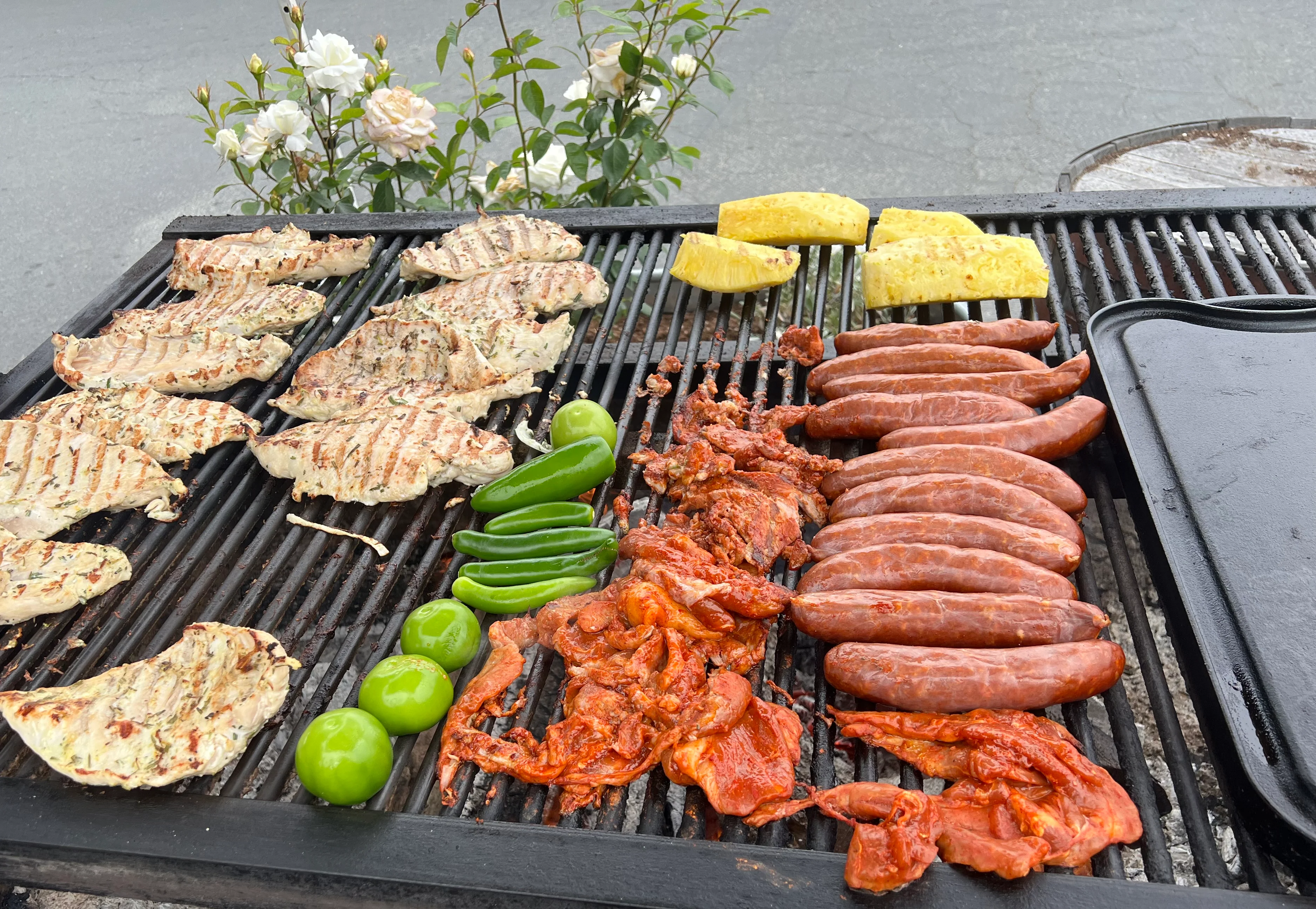 Grilled Mexican carne asada with vegetables and pineapple