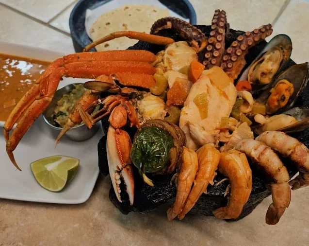 Mexican seafood platter with crab, shrimp, and octopus