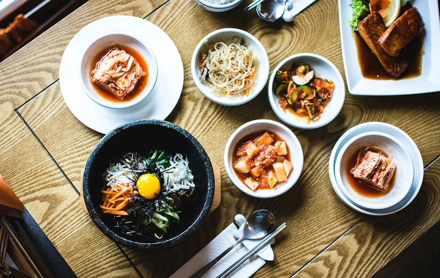 Korean bibimbap served in a hot stone bowl