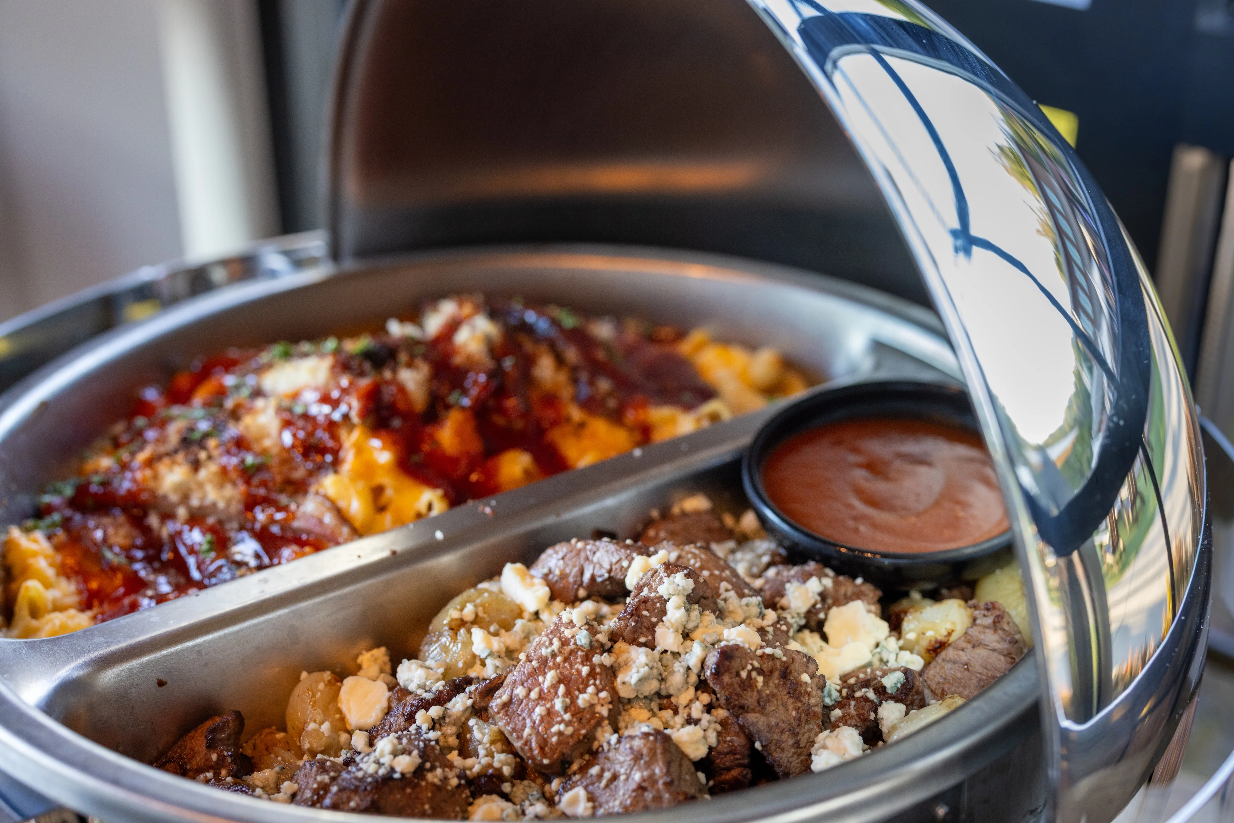 Savory mac and cheese with BBQ beef and steak bites