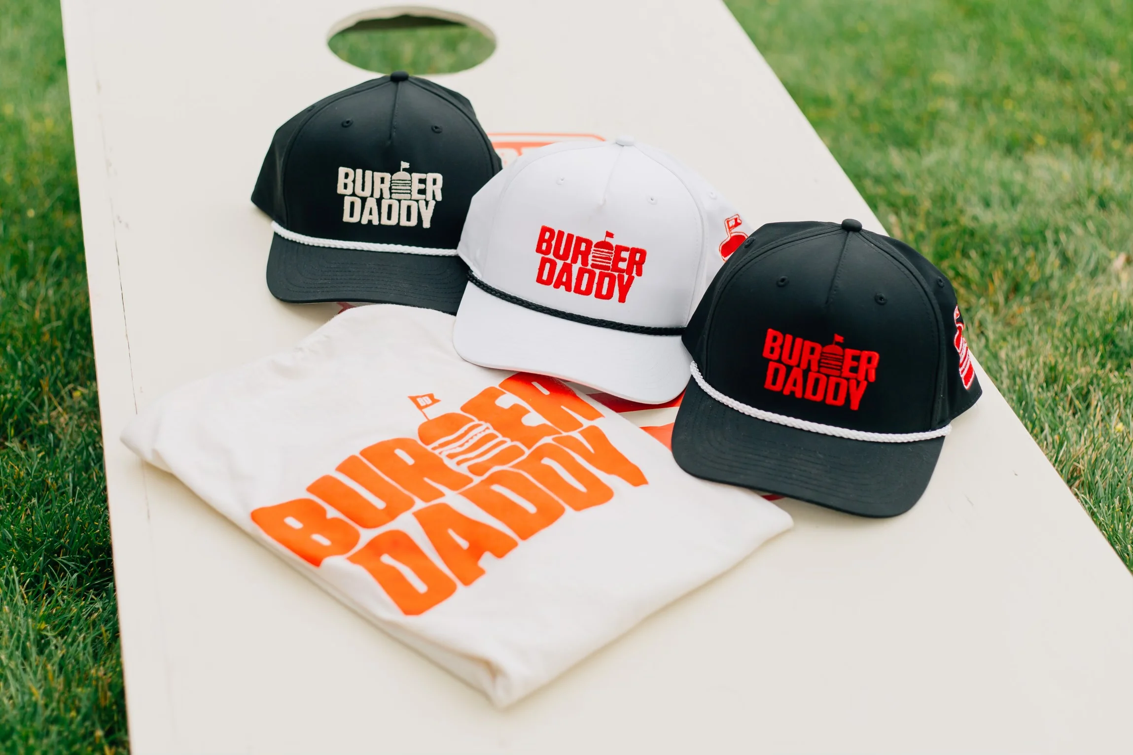 Stylish caps and t-shirt from Burger Daddy merchandise