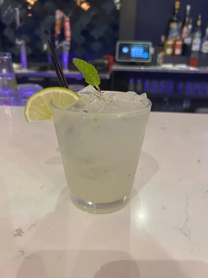 Refreshing mojito cocktail with lime and mint garnish